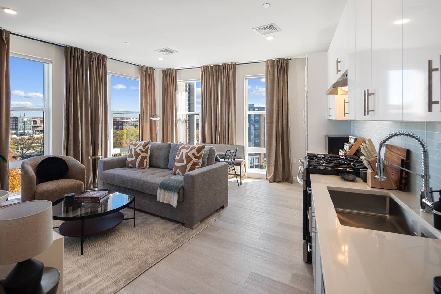 A bright living room and kitchen at The Mason in New Haven, Connecticut
